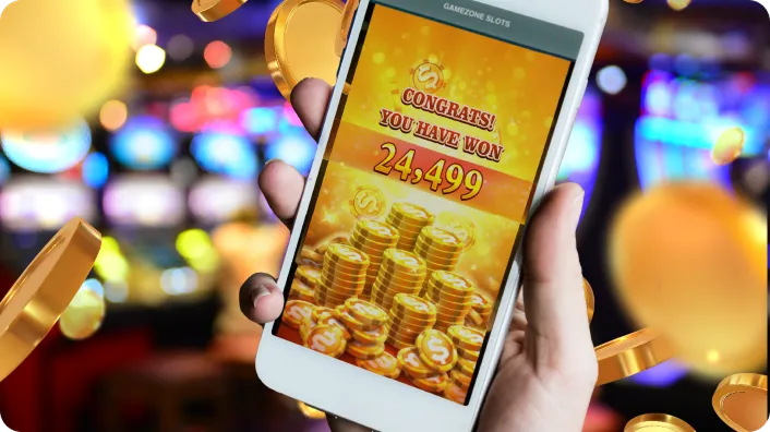 Hand holding a smartphone displaying an online casino game, illustrating mobile betting growth